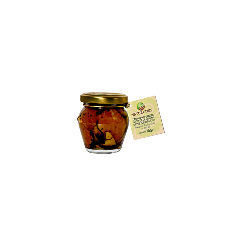 Tartufo nero a fette in olio di oliva (carpaccio)